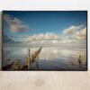fine art print of row poles in wadden sea