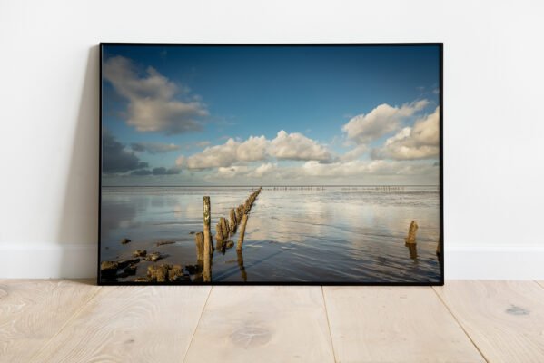 fine art print of row poles in wadden sea