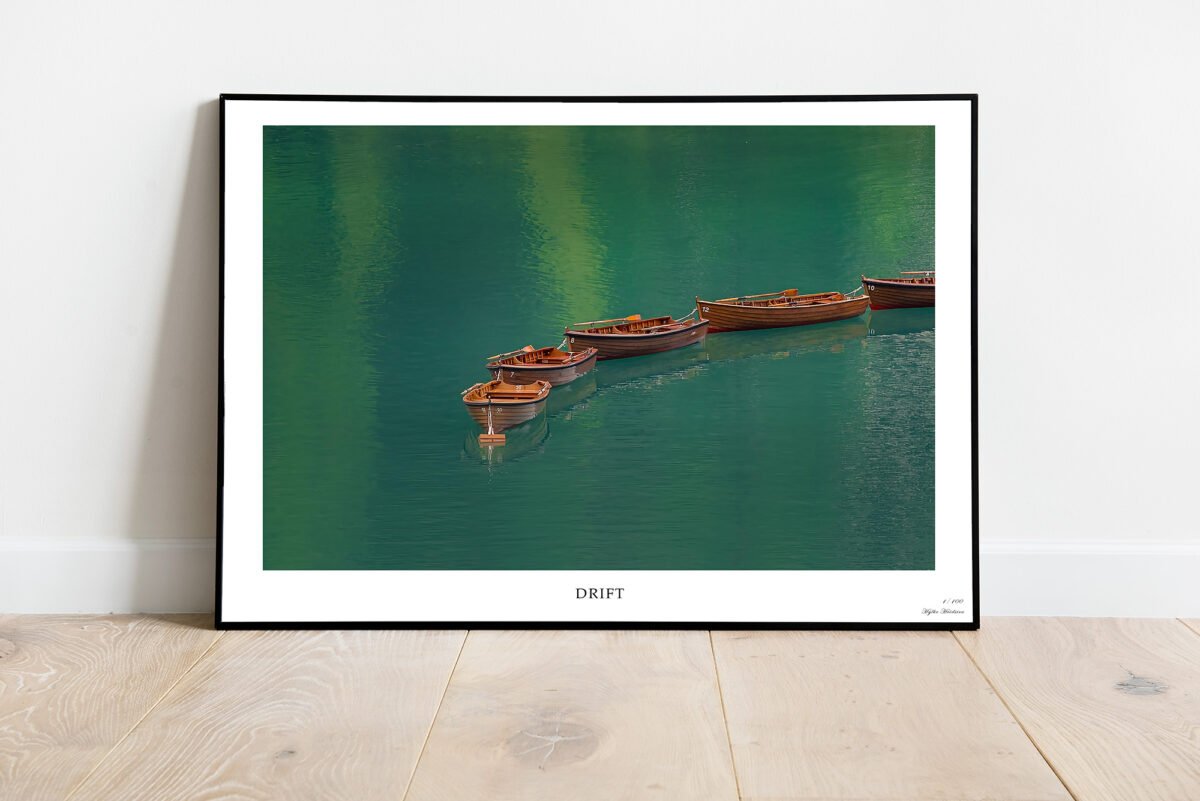 fine art print of rowing boats on emeral lake
