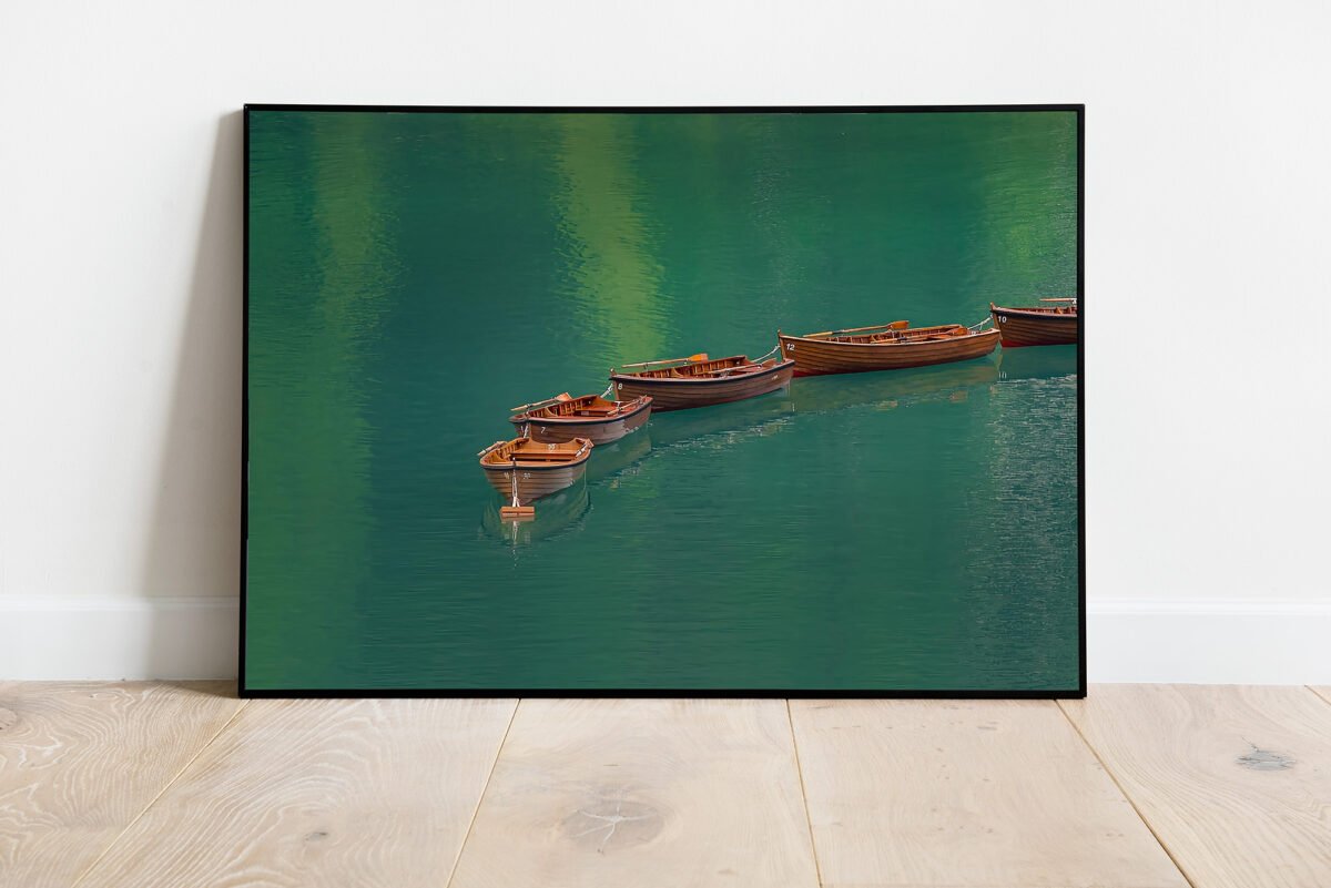 fine art print of rowing boats on emeral lake