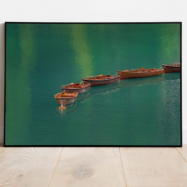 fine art print of rowing boats on emeral lake
