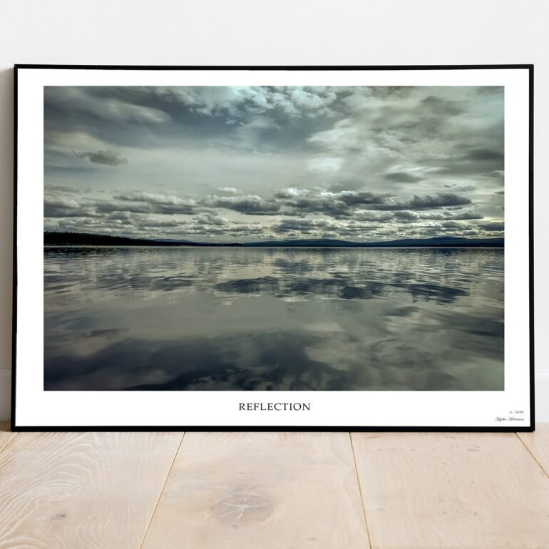 fine art print of a calm lake with clouds reflection