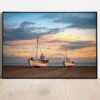 ine art print of fishing boats resting on Thorup Beach, Denmark at sunset.