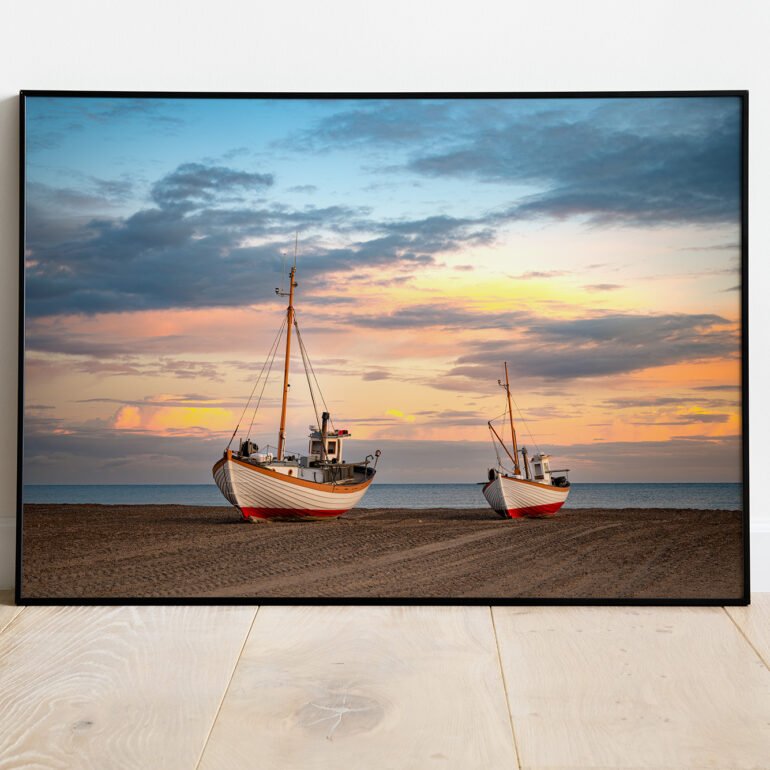 ine art print of fishing boats resting on Thorup Beach, Denmark at sunset.