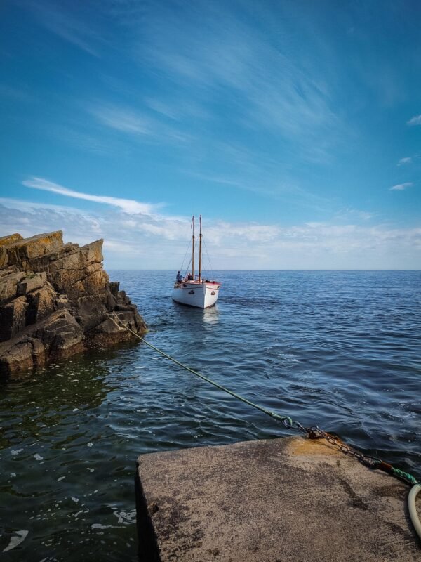 Granite rock formations with blue Baltic Sea in the background