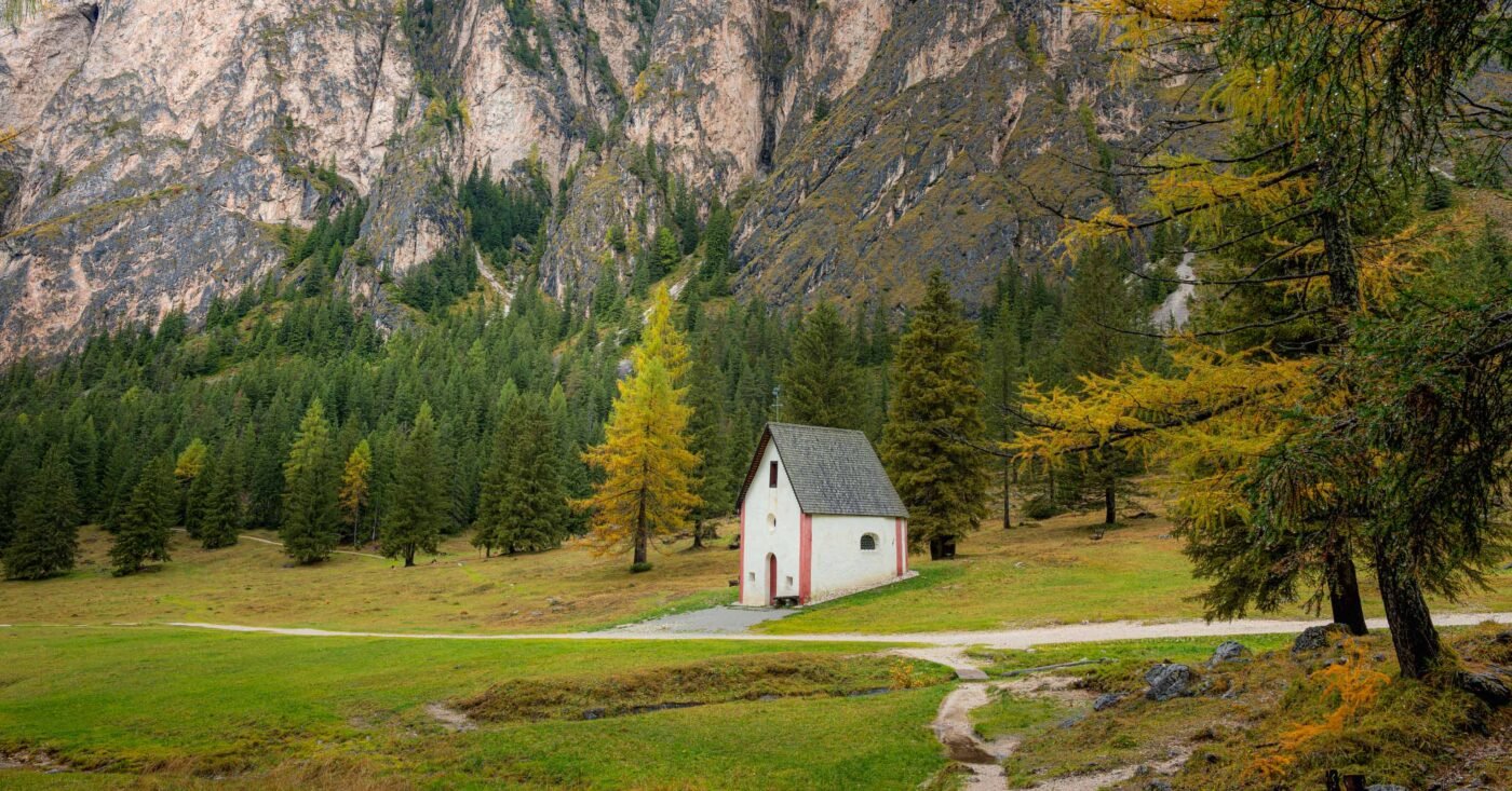 St Sylvester's Chapel at the entrance to the Vallunga valley with mountain peaks in the background