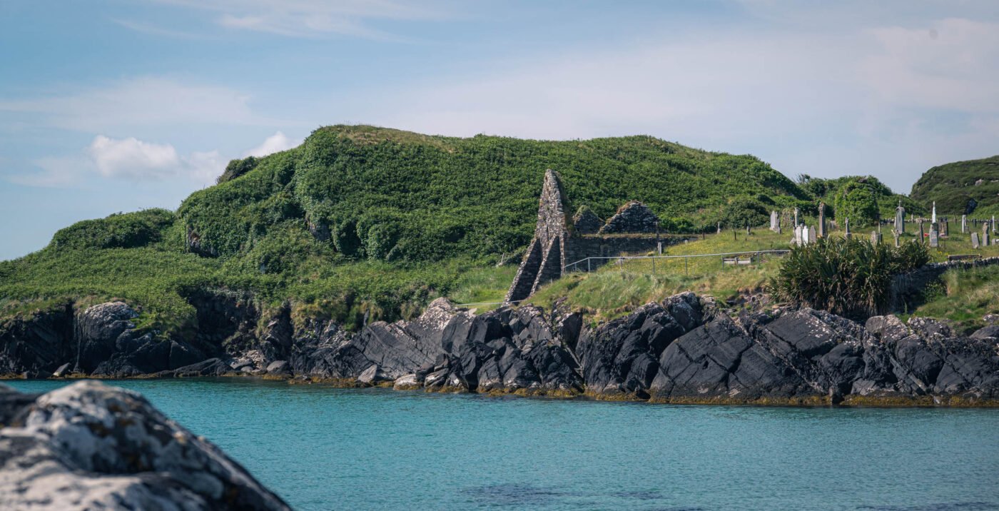 Gravestones and sea Abbey Island Kerry