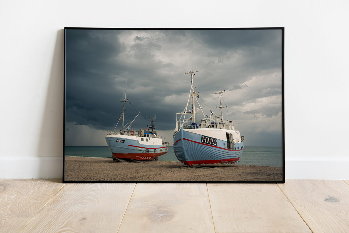 Hiding – Fine Art Print of fishing boats on the beach in Denmark